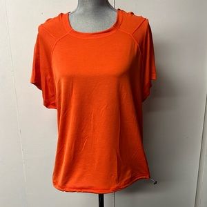 Athleta brand loose fitting, airy orange cap sleeve top, beach wear